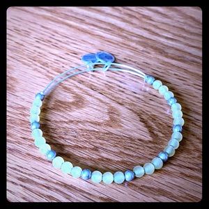 Yellow beaded Alex and Ani bracelet